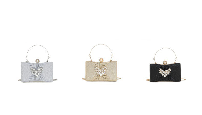 Crystal Pleated Clutch — Sculpted Metallic Shine