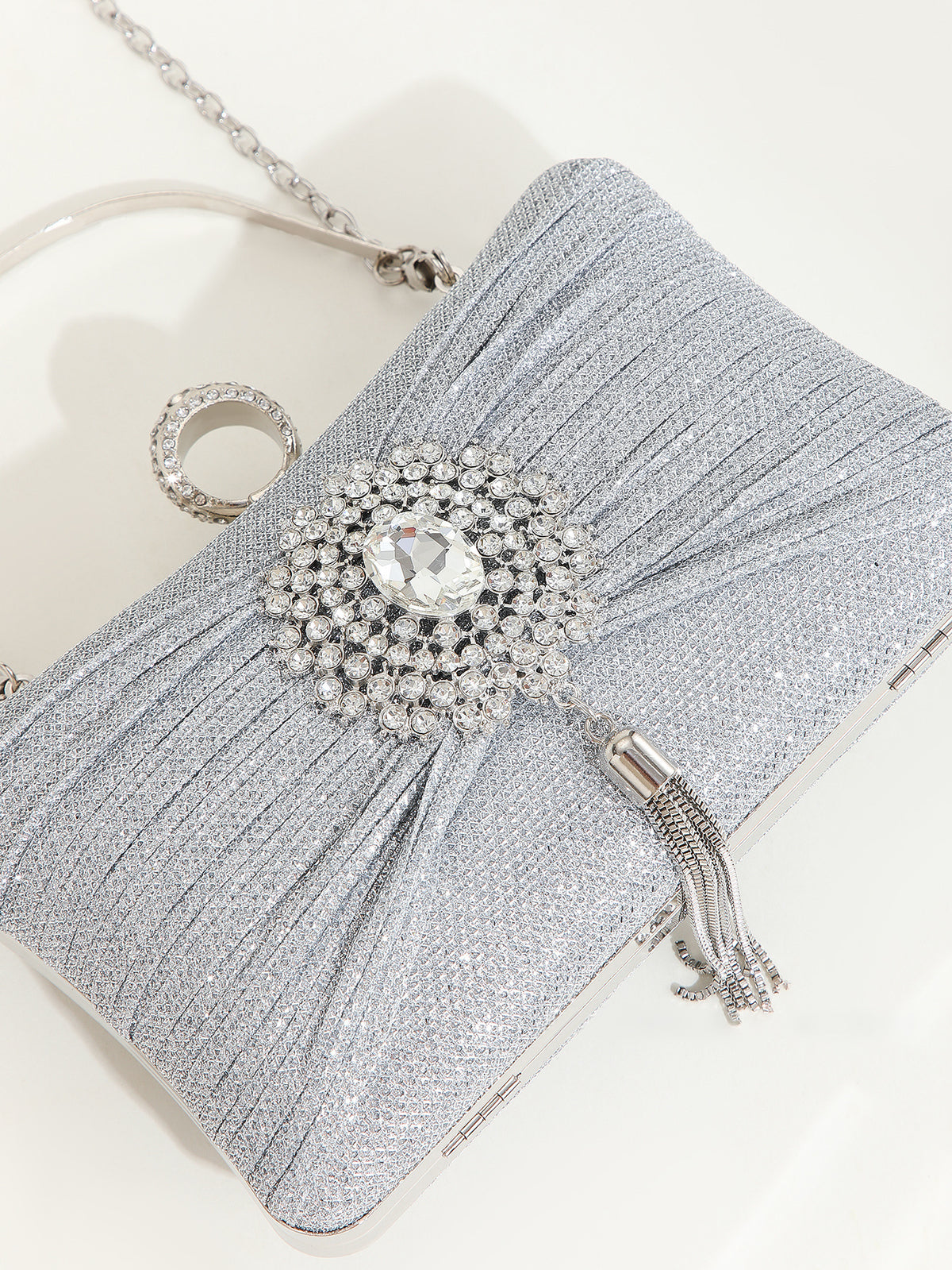 Crystal-Embellished Clutch — Sculpted Silver Shine