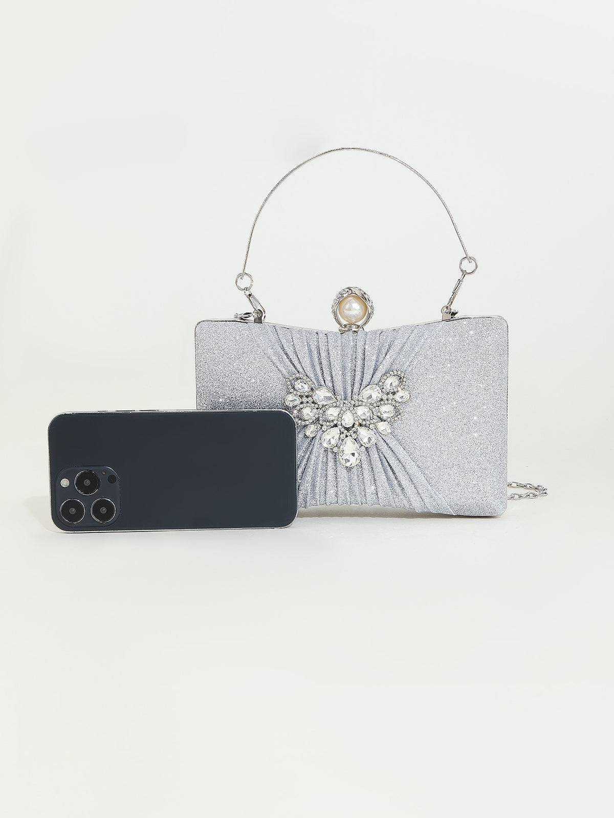 Crystal Pleated Clutch — Sculpted Metallic Shine
