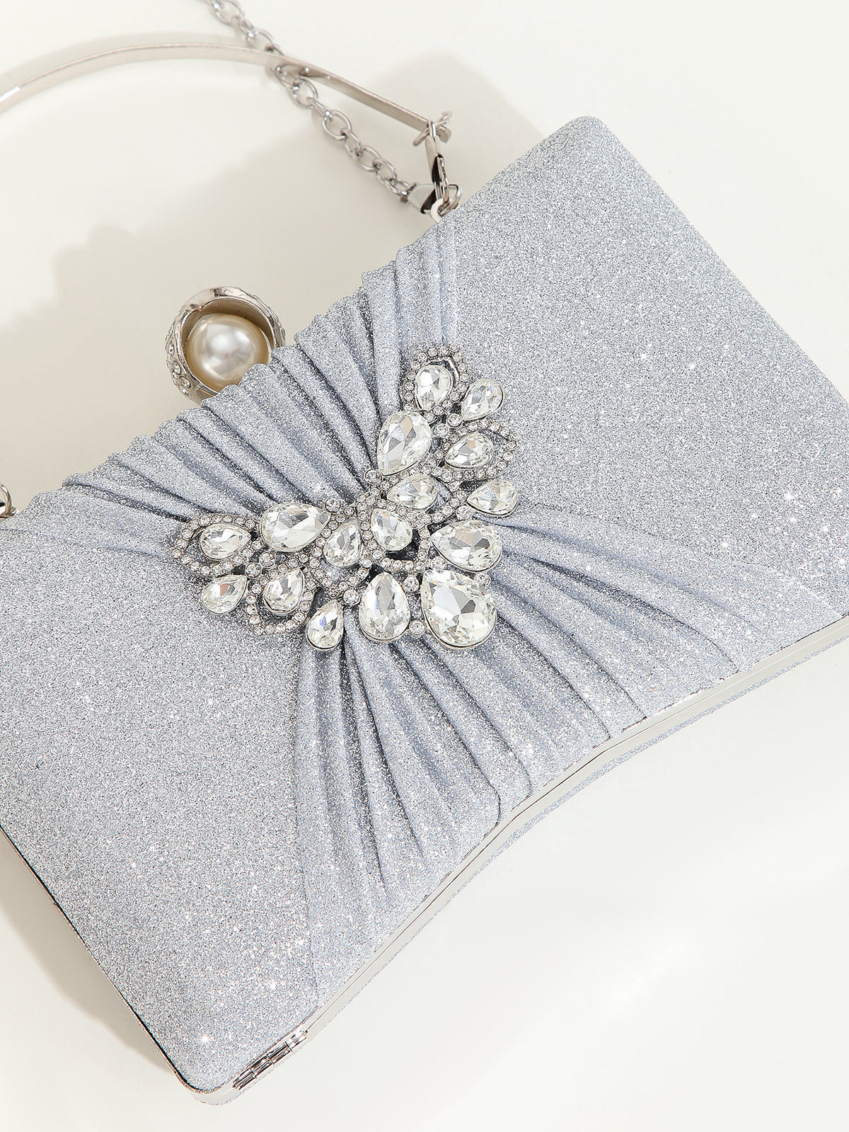 Crystal Pleated Clutch — Sculpted Metallic Shine
